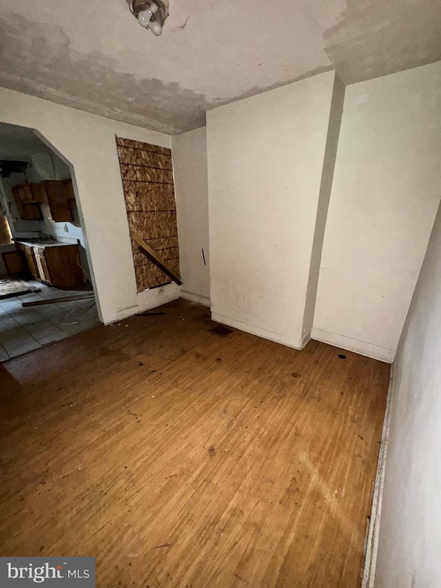 328 S Payson St, Baltimore, MD 21223 - unfurnished room featuring hardwood / wood-style floors
