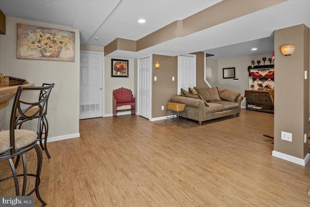 4127 Ford Dr, Emmaus, PA 18049 - living area with wood finished floors, baseboards, and stairs
