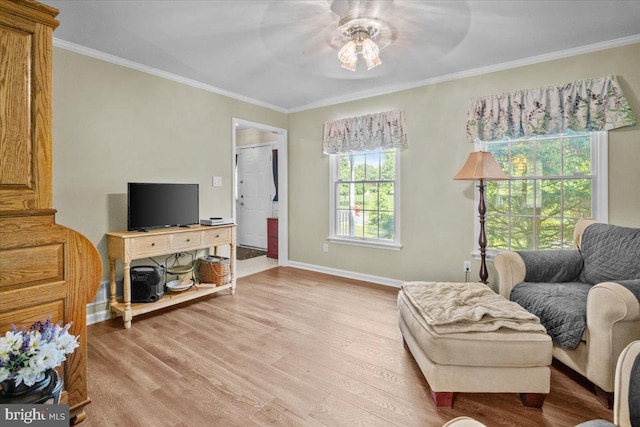 4127 Ford Dr, Emmaus, PA 18049 - living area featuring a ceiling fan, wood finished floors, crown molding, and baseboards