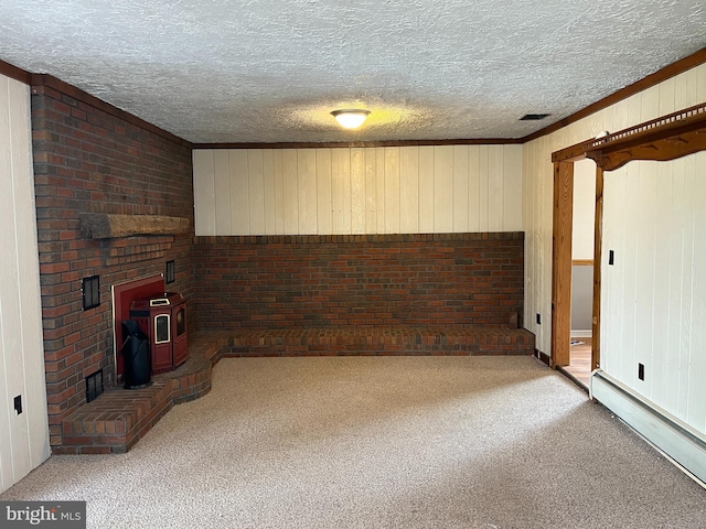 517 S Wayne St, Lewistown, PA 17044 - unfurnished living room featuring a baseboard heating unit, light colored carpet, a wood stove, a textured ceiling, and wooden walls