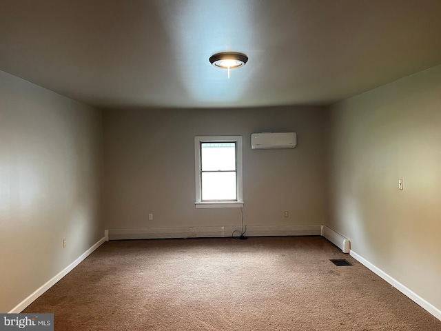517 S Wayne St, Lewistown, PA 17044 - carpeted empty room with a wall unit AC and baseboards