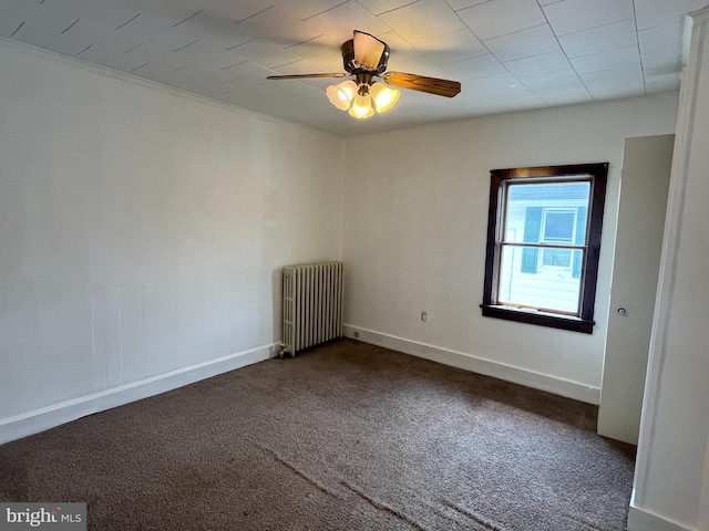 517 S Wayne St, Lewistown, PA 17044 - empty room with radiator heating unit, dark carpet, a ceiling fan, and baseboards