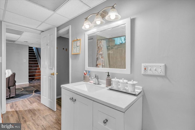 859 Columbia Ave, Newfield, NJ 08344 - bathroom with vanity, wood finished floors, a drop ceiling, and curtained shower