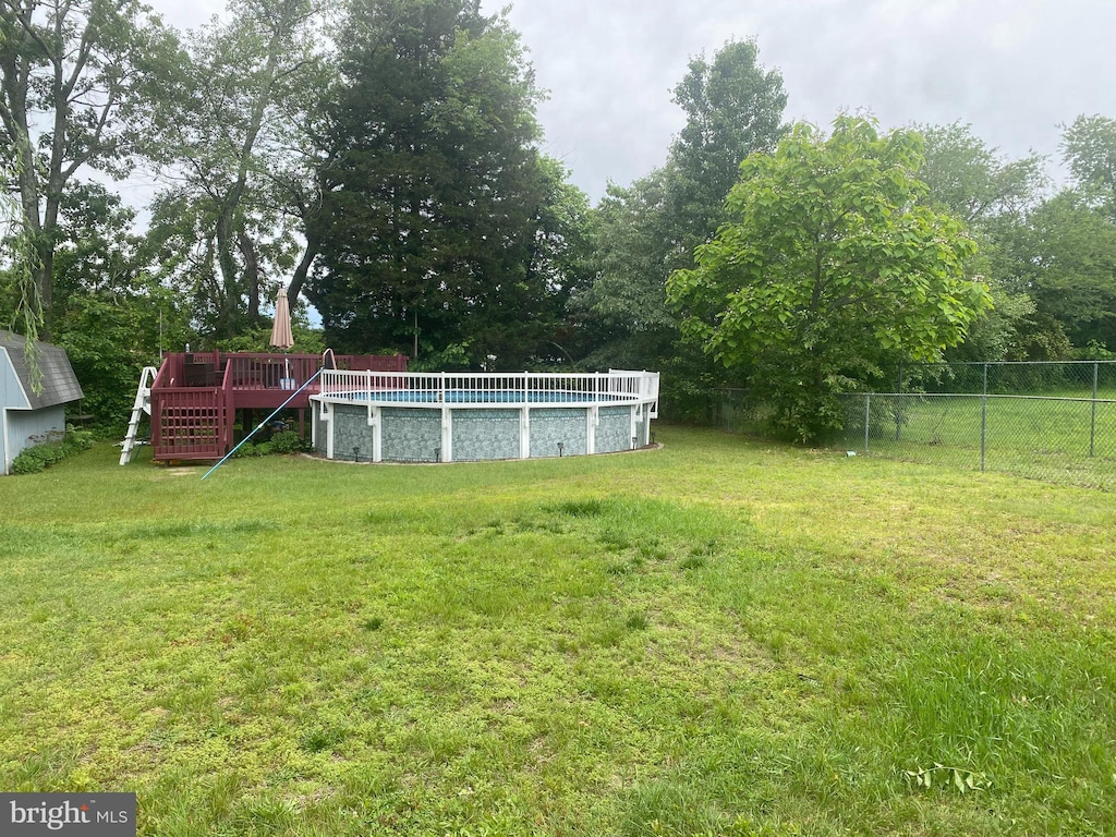 859 Columbia Ave, Newfield, NJ 08344 - view of yard with a deck and an outdoor pool