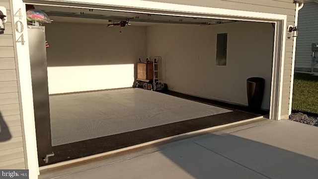404 Jensen Way E, Martinsburg, WV 25401 - garage featuring electric panel and ceiling fan