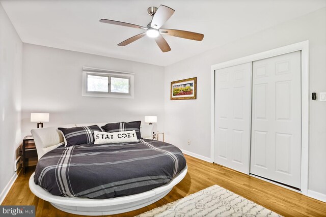 11106 Byrd Dr, Fairfax, VA 22030 - bedroom featuring baseboards, wood finished floors, a closet, and ceiling fan
