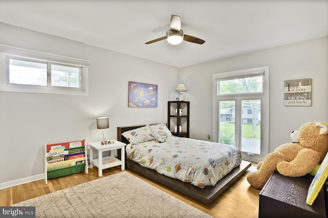 11106 Byrd Dr, Fairfax, VA 22030 - bedroom featuring wood finished floors, a ceiling fan, and baseboards