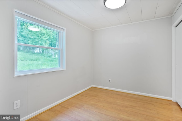 11106 Byrd Dr, Fairfax, VA 22030 - unfurnished room featuring crown molding, light wood finished floors, and baseboards
