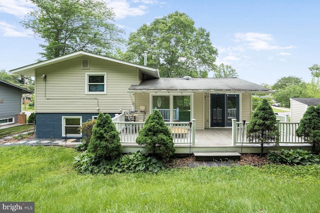 11106 Byrd Dr, Fairfax, VA 22030 - rear view of property featuring a lawn and a wooden deck