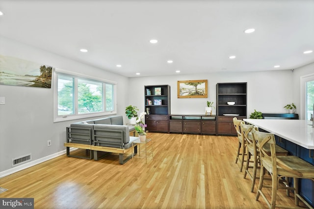 11106 Byrd Dr, Fairfax, VA 22030 - living room featuring light wood-style floors, recessed lighting, and baseboards