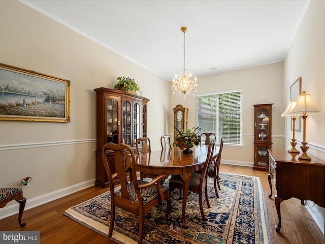 130 Grosbeak Ct, Lake Frederick, VA 22630 - dining area featuring a chandelier, light wood-style flooring, baseboards, and crown molding