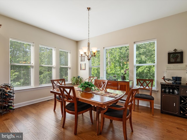 130 Grosbeak Ct, Lake Frederick, VA 22630 - dining space with baseboards, plenty of natural light, and hardwood / wood-style floors