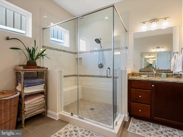 130 Grosbeak Ct, Lake Frederick, VA 22630 - full bath featuring vanity, a stall shower, and tile patterned flooring