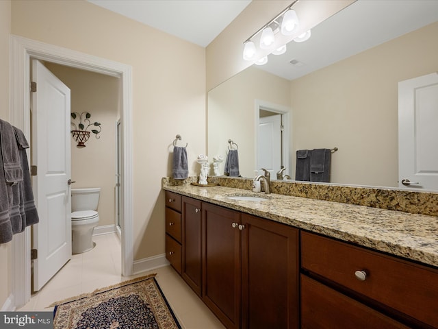 130 Grosbeak Ct, Lake Frederick, VA 22630 - bathroom with vanity, toilet, a stall shower, baseboards, and tile patterned flooring