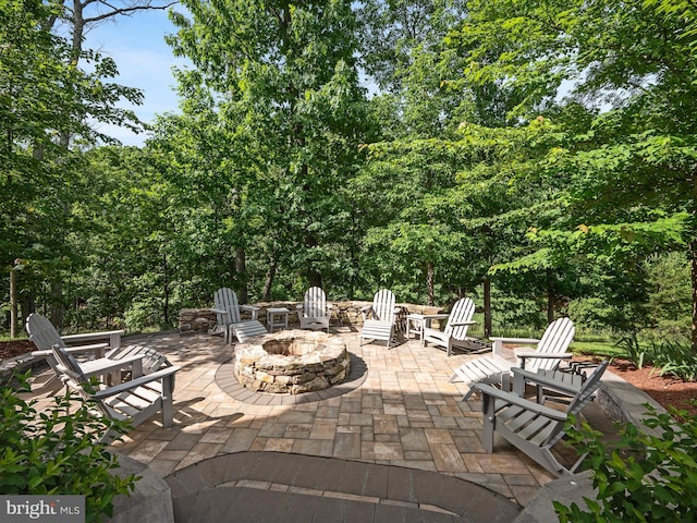 130 Grosbeak Ct, Lake Frederick, VA 22630 - view of patio / terrace with an outdoor fire pit