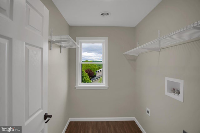 1777 Felmey Rd, Winfield, PA 17889 - washroom with washer hookup, baseboards, dark wood-style floors, and electric dryer hookup