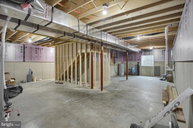 1777 Felmey Rd, Winfield, PA 17889 - basement with water heater and a water pressure tank