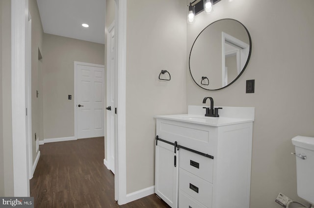 1777 Felmey Rd, Winfield, PA 17889 - bathroom with vanity, wood finished floors, baseboards, toilet, and recessed lighting