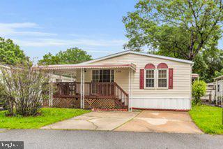 129 Trailway Rd, Middle River, MD 21220 - manufactured / mobile home with covered porch