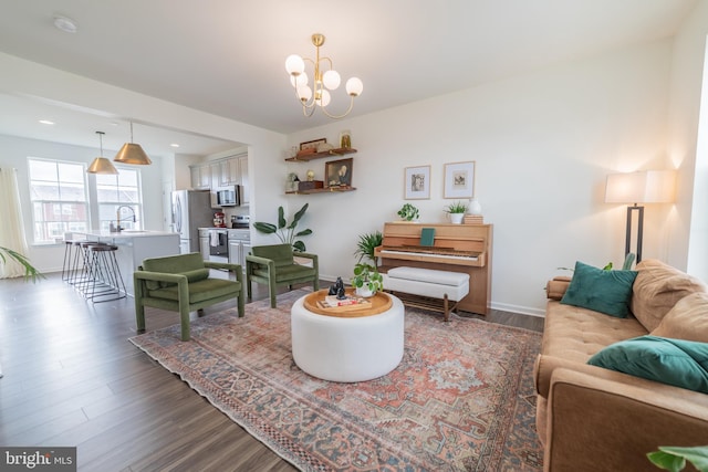 30 Kirby Ct, Bunker Hill, WV 25413 - living area with dark wood finished floors, a chandelier, baseboards, and recessed lighting