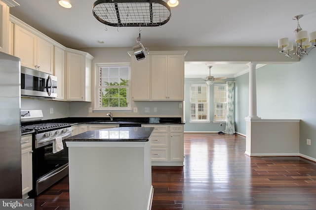242 Tilden Way Unit 7242, Edgewater, MD 21037 - kitchen featuring stainless steel appliances, recessed lighting, ornate columns, a kitchen island, and white cabinets