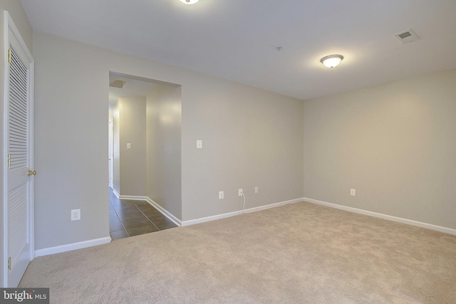 242 Tilden Way Unit 7242, Edgewater, MD 21037 - unfurnished room featuring dark carpet and dark tile patterned floors