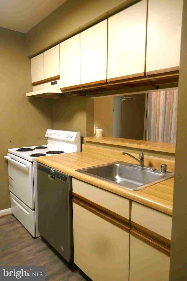 1647 Carriage House Ter Unit 1647-C, Silver Spring, MD 20904 - kitchen with white range with electric cooktop, under cabinet range hood, a sink, stainless steel dishwasher, and light countertops