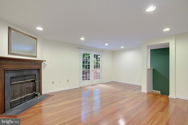 2566 Log Mill Ct, Crofton, MD 21114 - unfurnished living room featuring wood finished floors, recessed lighting, a glass covered fireplace, and baseboards