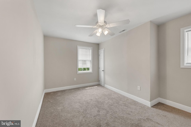1508 W 36th St W, Baltimore, MD 21211 - carpeted empty room featuring baseboards and a ceiling fan