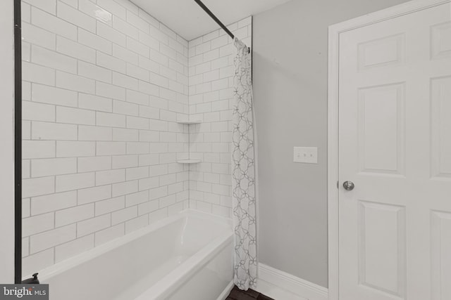 1508 W 36th St W, Baltimore, MD 21211 - bathroom with shower / bath combo and baseboards