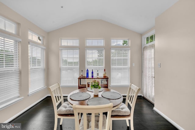 12116 Elmwood Dr, Brandywine, MD 20613 - dining area featuring dark wood-style flooring, lofted ceiling, and baseboards