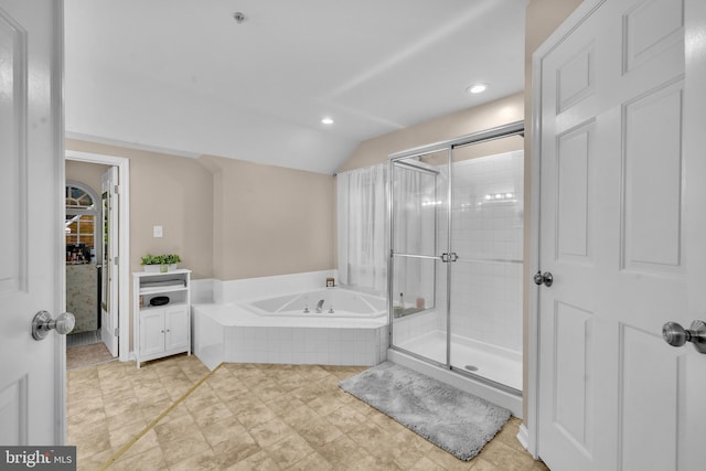 12116 Elmwood Dr, Brandywine, MD 20613 - full bathroom featuring a stall shower, a bath, lofted ceiling, recessed lighting, and a closet