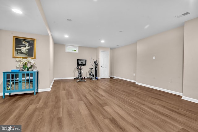 12116 Elmwood Dr, Brandywine, MD 20613 - workout room featuring wood finished floors, baseboards, and recessed lighting