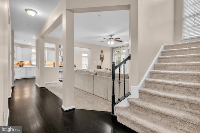 12116 Elmwood Dr, Brandywine, MD 20613 - entrance foyer with a ceiling fan, stairs, dark wood-type flooring, baseboards, and recessed lighting