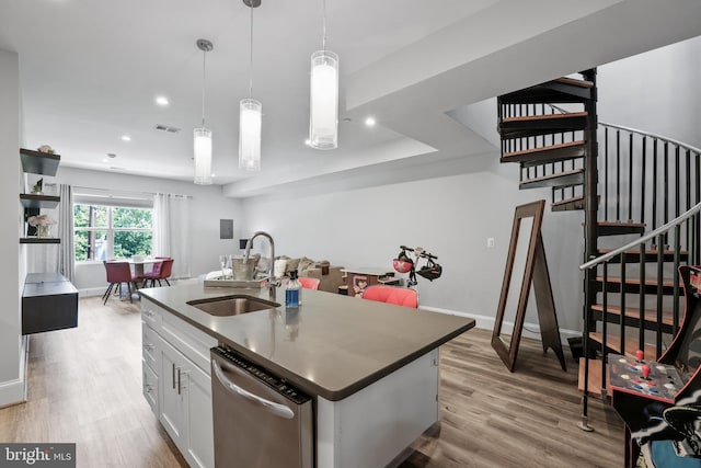 2221 M St NE Unit Ph1, Washington, DC 20002 - kitchen with dishwasher, a sink, open floor plan, wood finished floors, and recessed lighting
