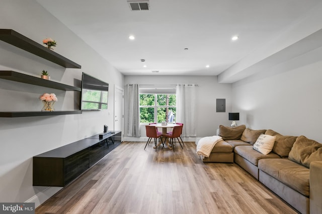 2221 M St NE Unit Ph1, Washington, DC 20002 - living area featuring light wood finished floors, recessed lighting, baseboards, and electric panel