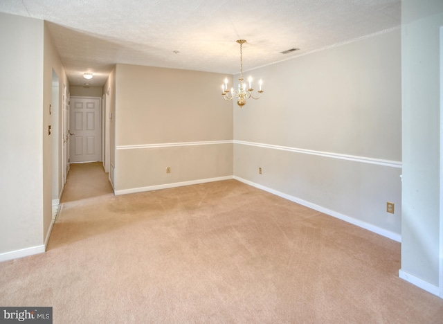 106 Gwen Dr Unit 106-1J, Forest Hill, MD 21050 - unfurnished room with light colored carpet, a chandelier, and baseboards