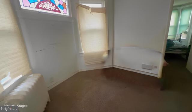 619 Sewall Ave, Asbury Park, NJ 07712 - unfurnished bedroom featuring carpet and baseboards