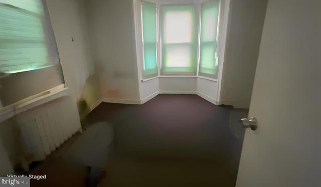 619 Sewall Ave, Asbury Park, NJ 07712 - unfurnished room featuring carpet flooring and baseboards