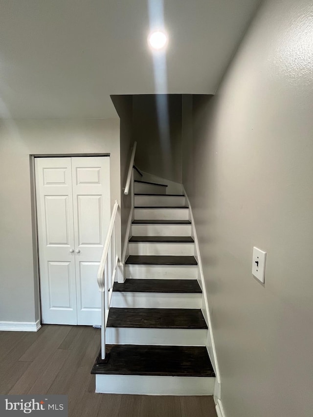 120 N Baylor Dr, Sterling, VA 20164 - staircase with wood finished floors and baseboards
