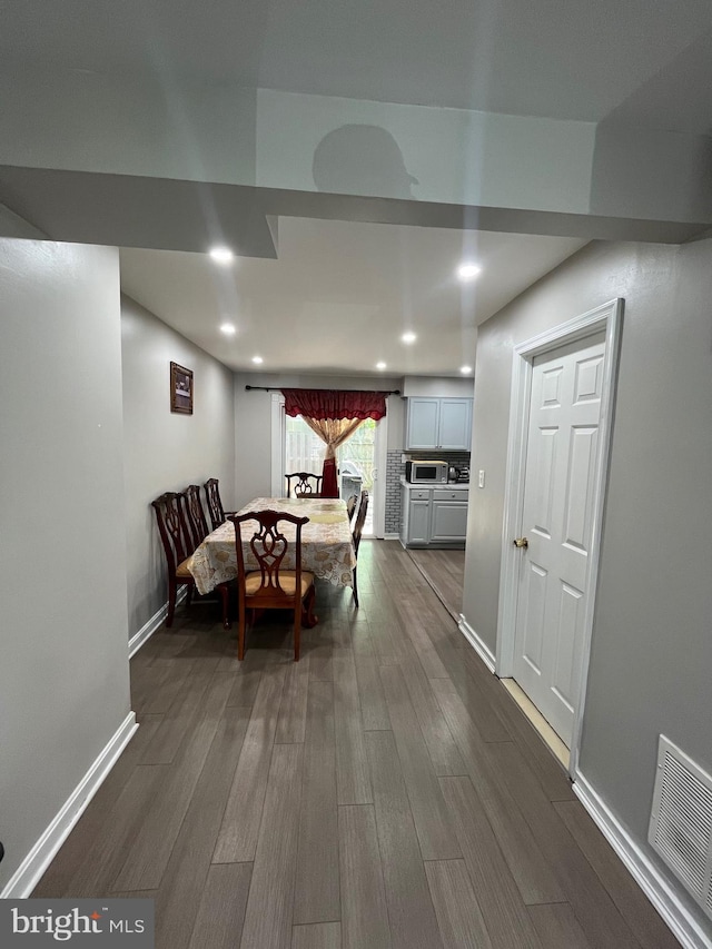 120 N Baylor Dr, Sterling, VA 20164 - dining room with dark wood-type flooring, baseboards, and recessed lighting