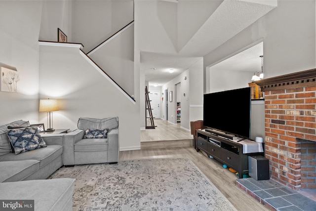74 Haverford Ct, Hillsborough, NJ 08844 - living area featuring wood finished floors, stairs, and baseboards