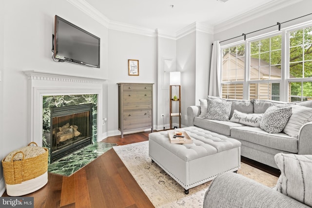 2738 Fresh Water Way, Odenton, MD 21113 - living room with crown molding, a premium fireplace, wood finished floors, and baseboards