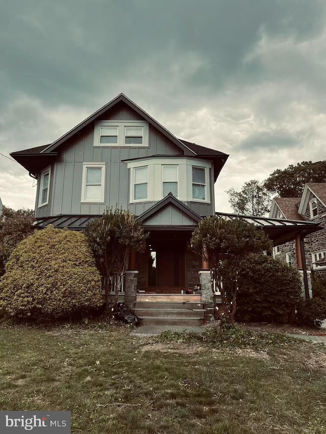 123 Bryn Mawr Ave, Bala Cynwyd, PA 19004 - view of front of home with board and batten siding and a porch