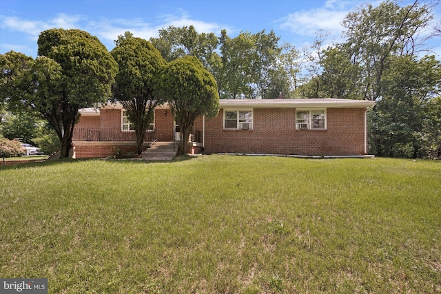 2055 Wharton Ave, Marcus Hook, PA 19061 - ranch-style house featuring a front yard and brick siding