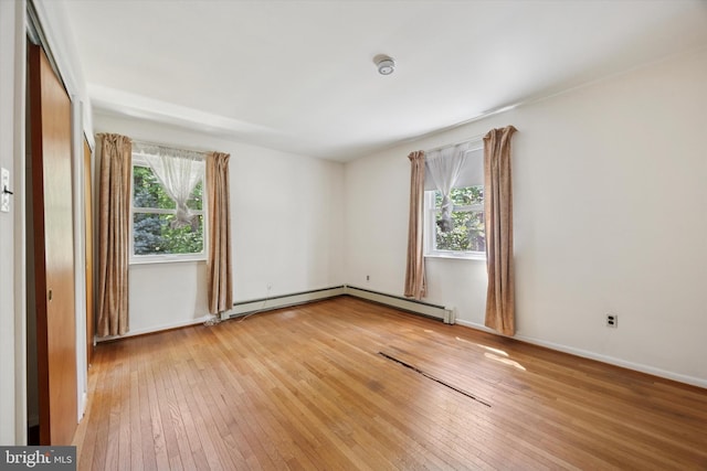 2055 Wharton Ave, Marcus Hook, PA 19061 - unfurnished room with healthy amount of natural light, light wood-style flooring, and baseboards