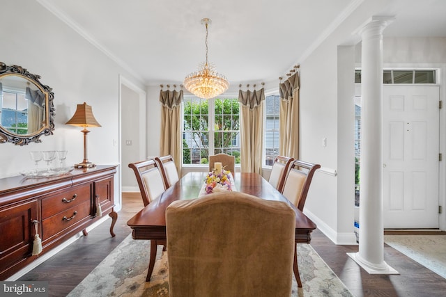 13443 Victory Gallop Way, Gainesville, VA 20155 - dining room with decorative columns, crown molding, dark wood-type flooring, baseboards, and a chandelier