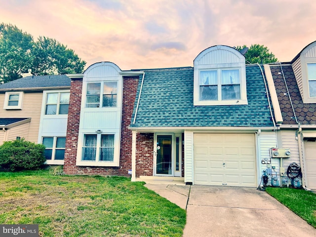 21 Oriole, Clementon, NJ 08021 - townhome / multi-family property with concrete driveway, a front lawn, a shingled roof, a garage, and brick siding