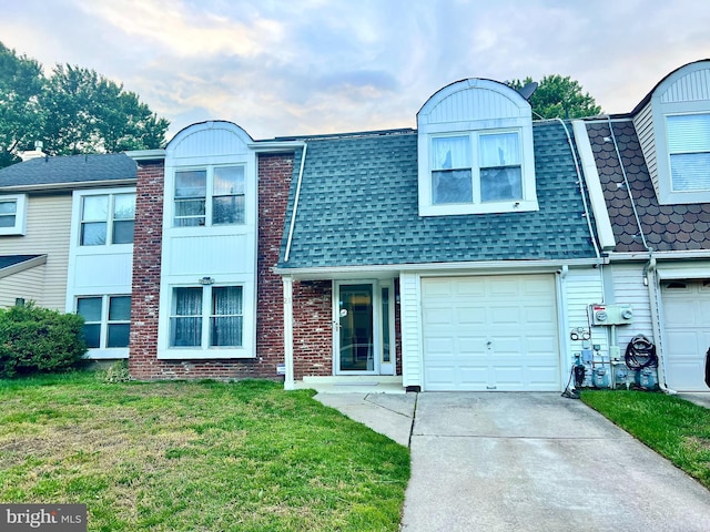 21 Oriole, Clementon, NJ 08021 - townhome / multi-family property with concrete driveway, roof with shingles, a front lawn, and an attached garage