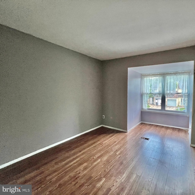 21 Oriole, Clementon, NJ 08021 - empty room featuring wood finished floors and baseboards